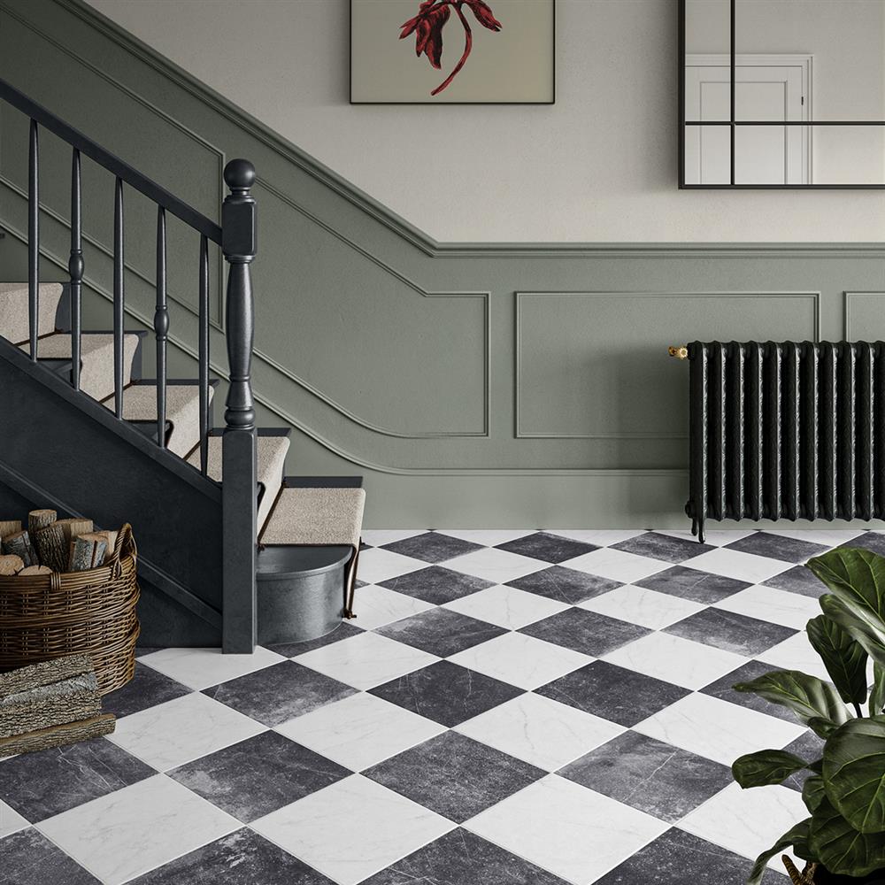 Black and white antique checkerboard tiles in a victorian hallway